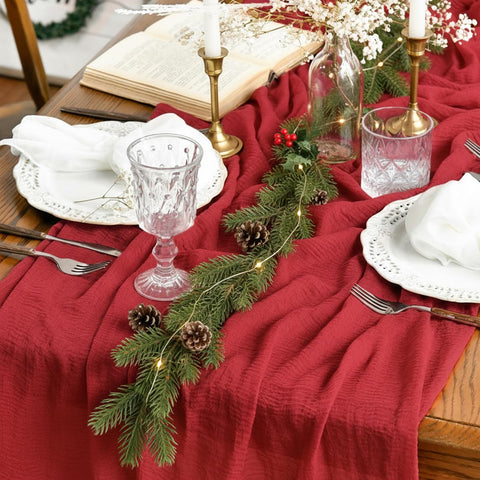 Artoid Mode boho red cheesecloth table layout with 160-inch length for large tables.