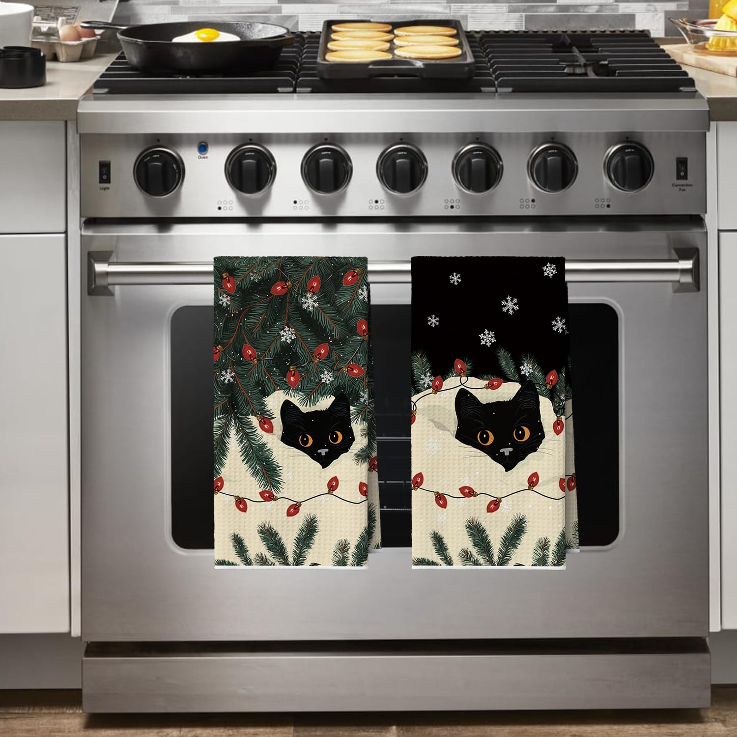 Artoid Mode bold patterned towels add decorative flair while drying dishes.