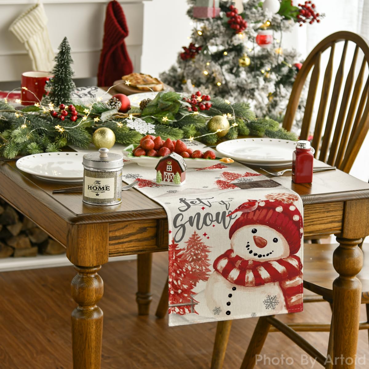 Artoid Mode red snowman table runner adds vibrant festive color to winter meals.