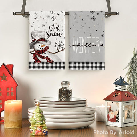 Artoid Mode buffalo plaid snowman towel showcases soft, cookware-safe material.