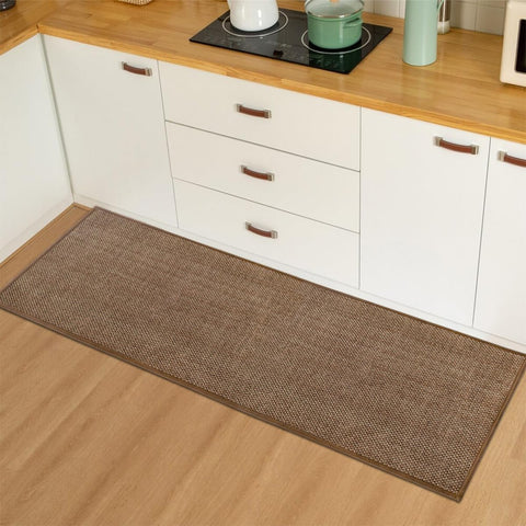 Artoid Mode chenille kitchen mat absorbs spills and dries quickly.