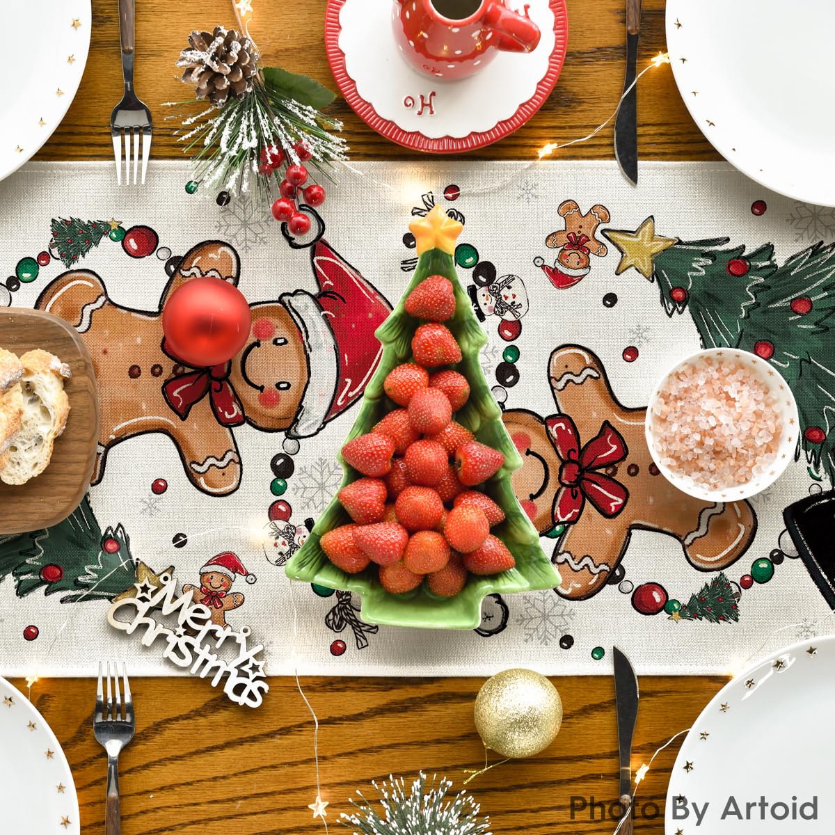 Artoid Mode christmas-pine-border-runner highlights seasonal theme for cozy family dinners.
