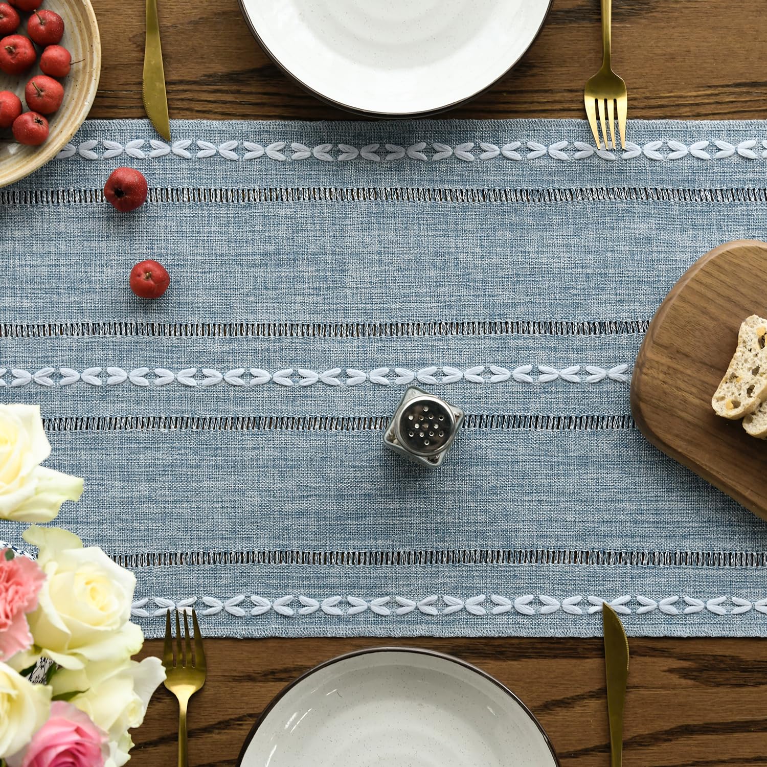 Artoid Mode dusty blue embroidery detail adds rustic charm to seasonal decor