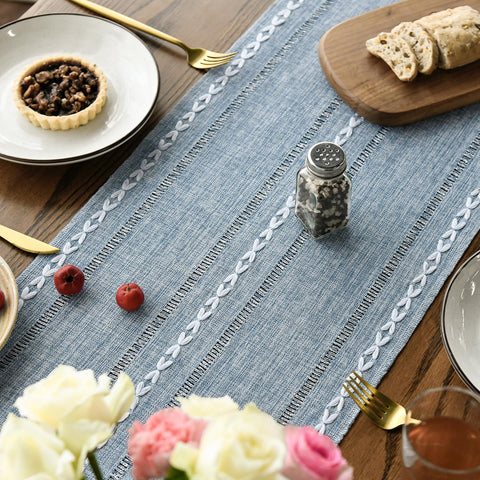 Artoid Mode dusty blue table runner flatlay showcasing color and fabric quality