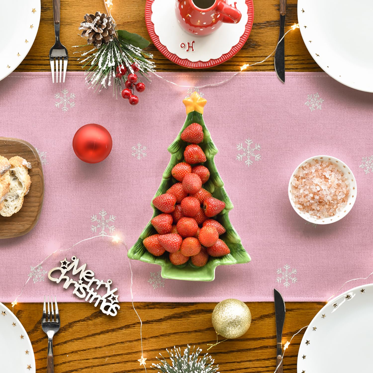 Artoid Mode festive-dining-pink table runner protects surfaces while decorating.