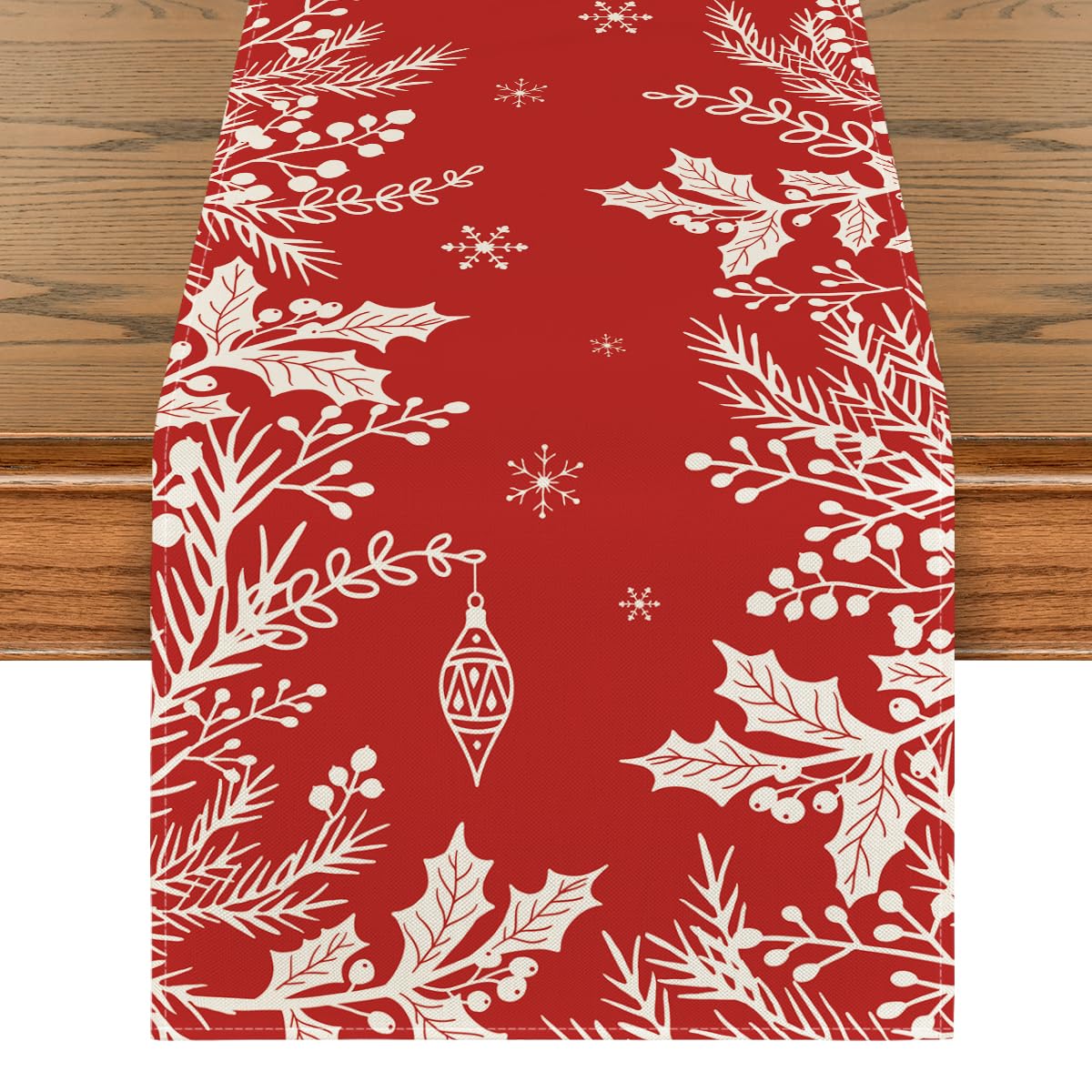 Artoid Mode holly pine branches table runner adds festive charm to holiday dining.