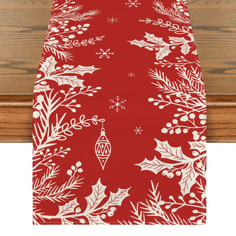 Artoid Mode holly pine branches table runner adds festive charm to holiday dining.