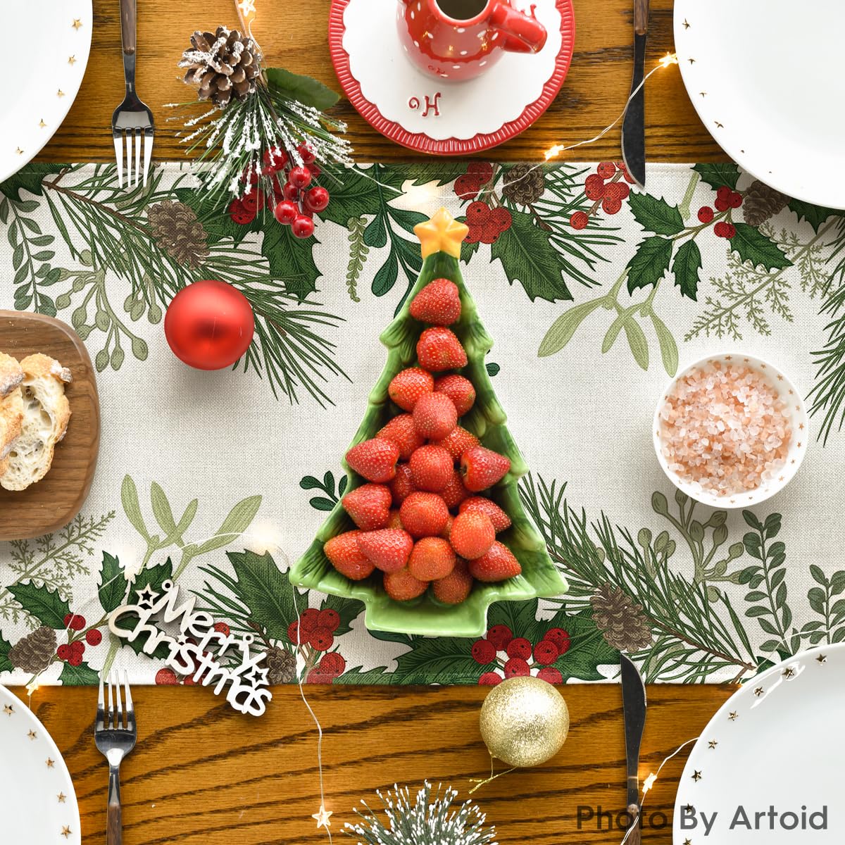 Artoid Mode Holly Pine Cone runner with holiday decor scene elevates table styling.