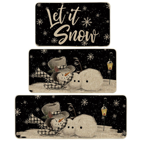 Artoid Mode Let It Snow 17x29 snowman mat with festive design and non-slip backing.