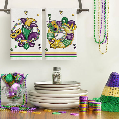 Artoid Mode Mardi Gras kitchen towel with bright colors for festive dish drying.