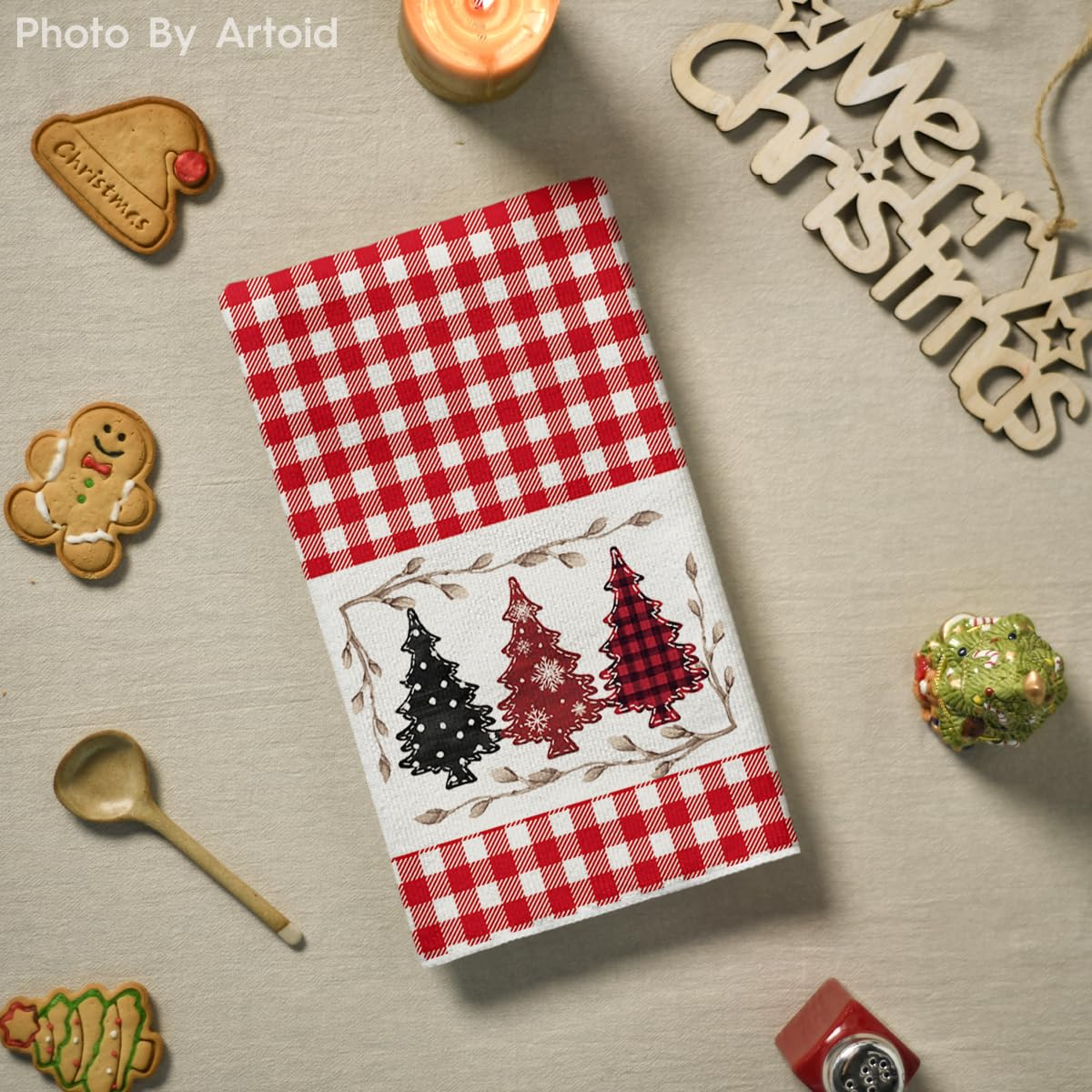 Artoid Mode holiday kitchen towel; festive decor meets practical cleaning.