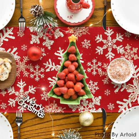 Artoid Mode red snowflakes table runner on dining table for holidays