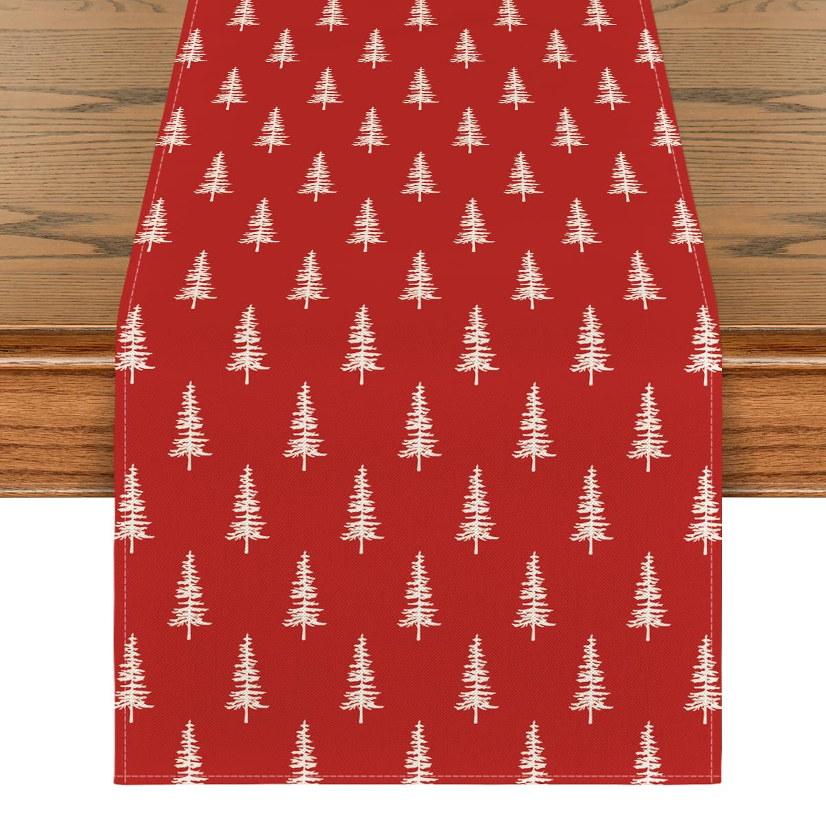 Artoid Mode red Xmas tree table runner on wood table elevates holiday decor.