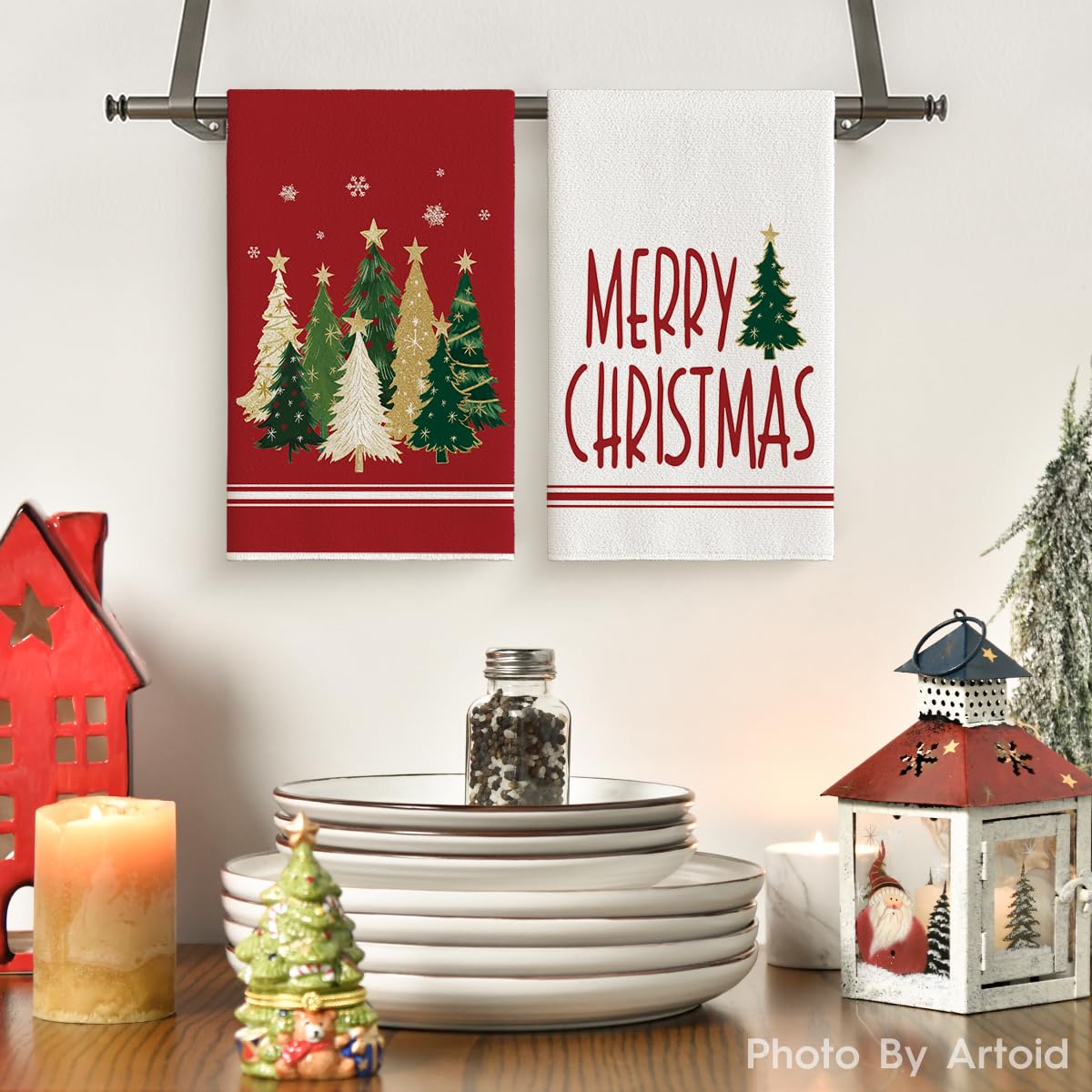 Artoid Mode star snowflakes design towels showcased with festive kitchen decor.