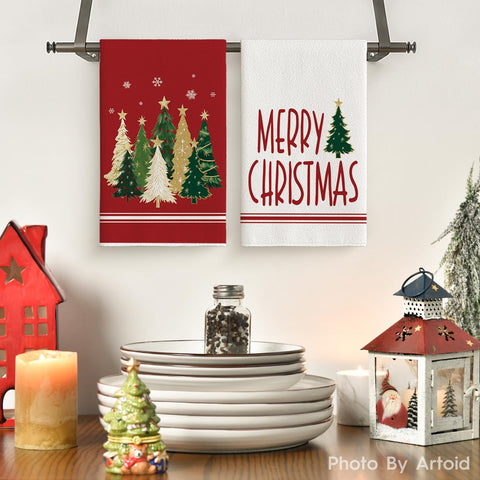 Artoid Mode star snowflakes design towels showcased with festive kitchen decor.