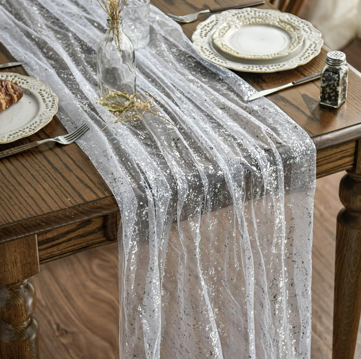 Artoid Mode white-silver gauze table runner for elegant dining and surface protection.