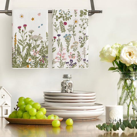 Artoid Mode Wildflower towels draped on counter showcase vibrant design and everyday practicality