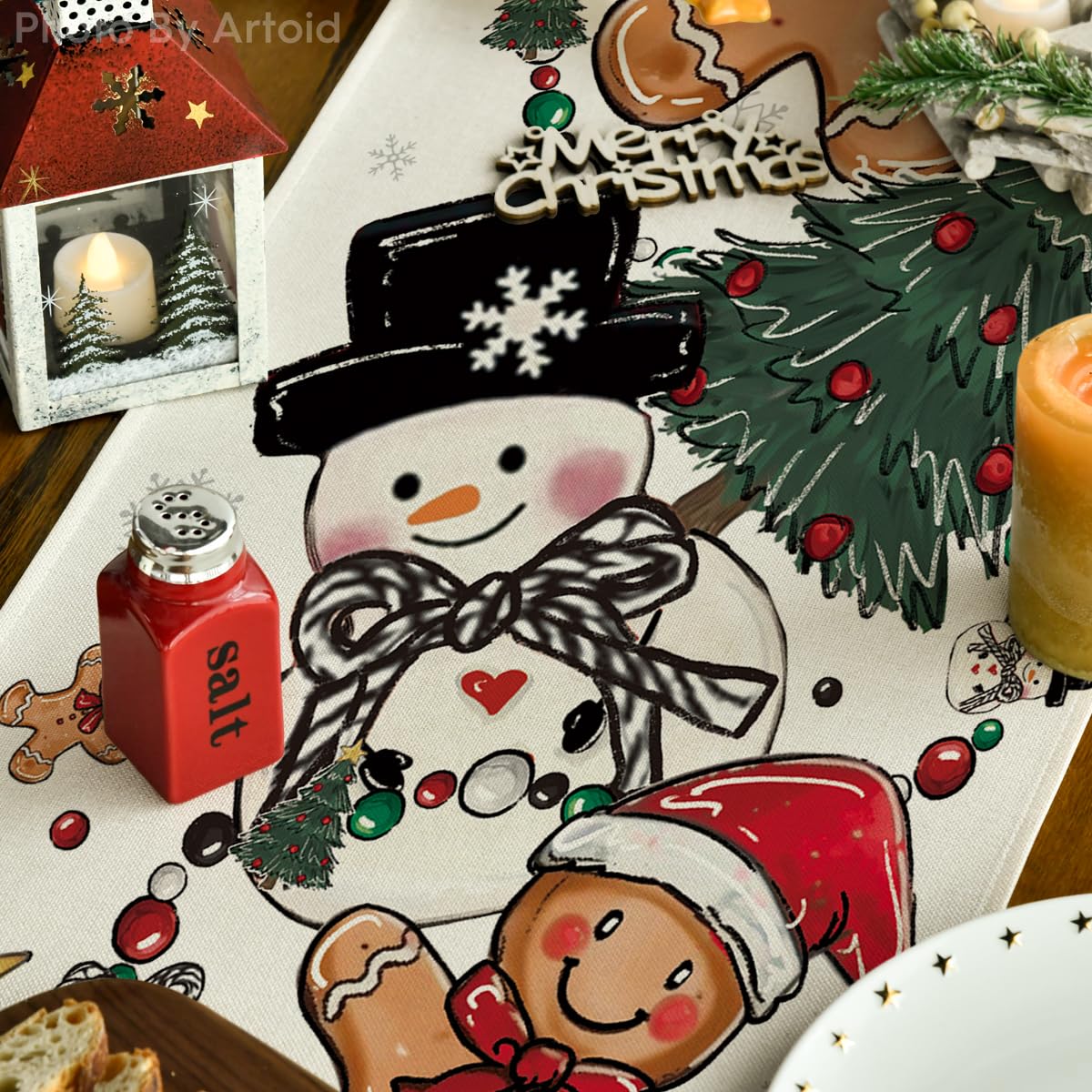 Artoid Mode winter pattern with pine accents adds color to your table setup.