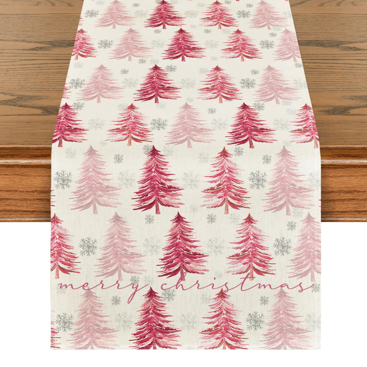 Artoid Mode Xmas Trees Snowflake table runner on pink holiday table for festive dining