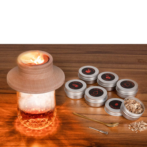 ArwySciI premium cocktail smoker kit used on a rocks glass for a refined ritual