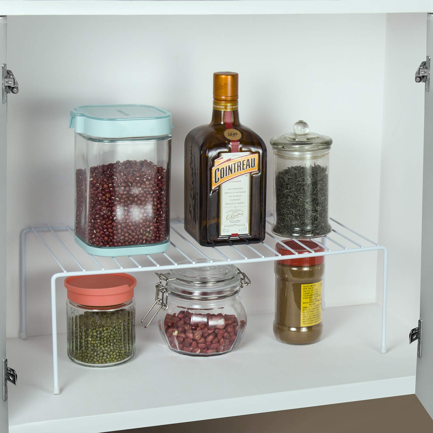 ASTOTSELL metal rack fixed in cupboards to maximize space.