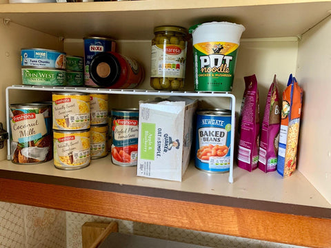 ASTOTSELL durable organiser used in pantry or bathroom for extra storage.