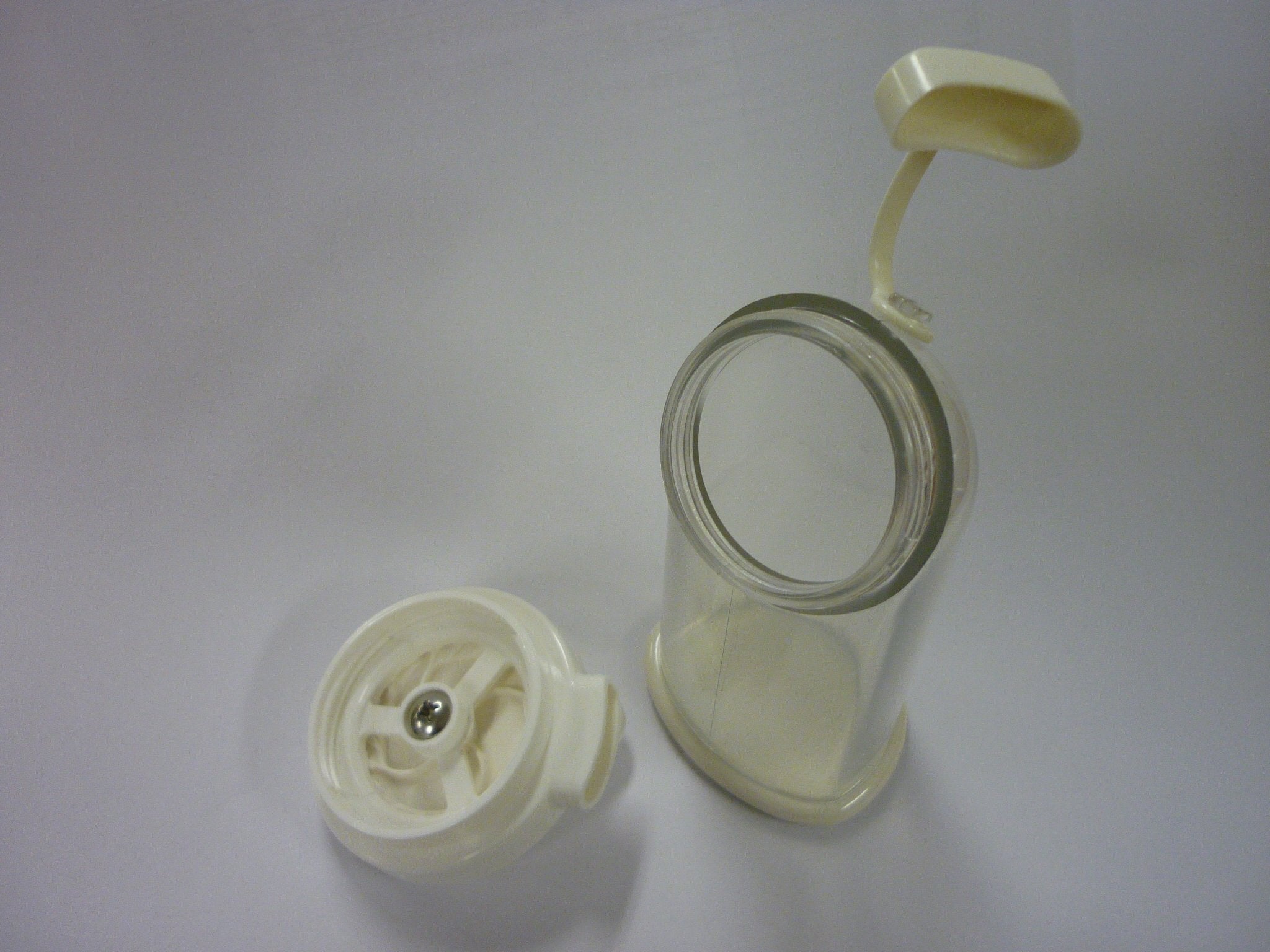 ASVEL sesame grinder white mechanism detail for easy operation.