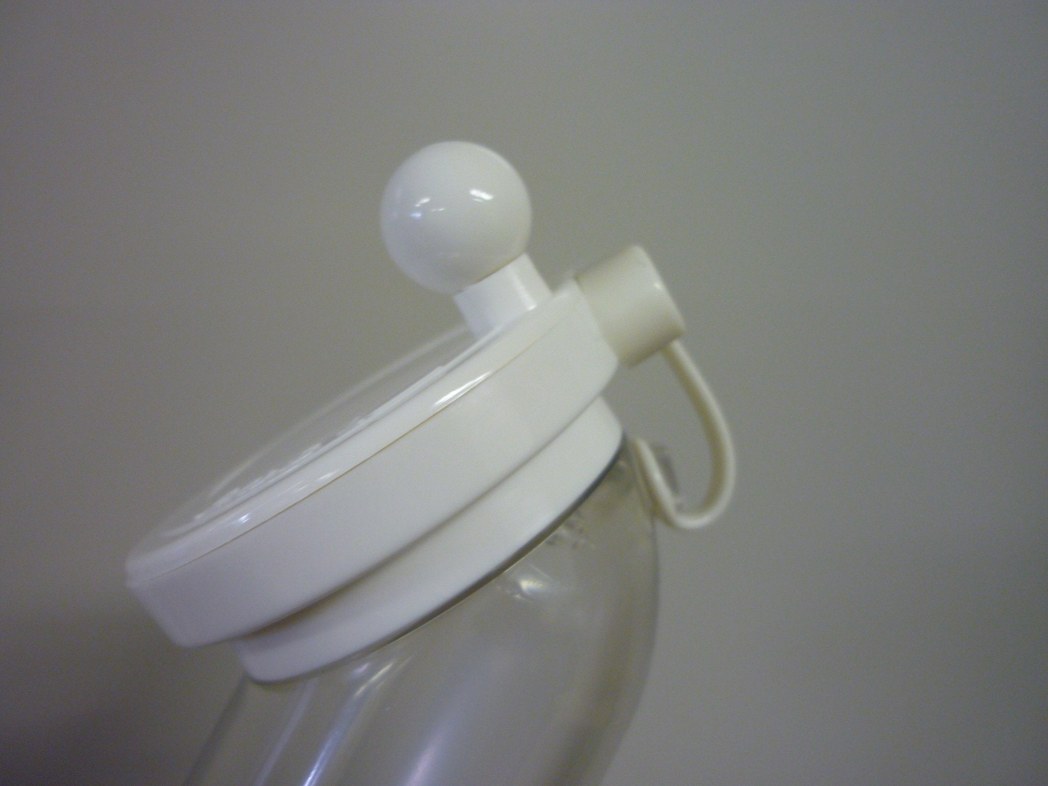 ASVEL sesame grinder white top view showing compact form.