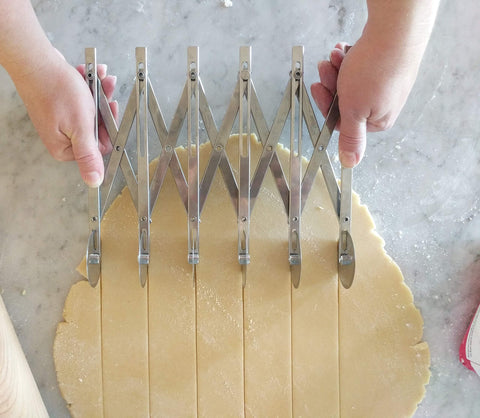 Ateco 5-Wheel Cutter with wingsnut lock illustrating secure, repeatable cuts