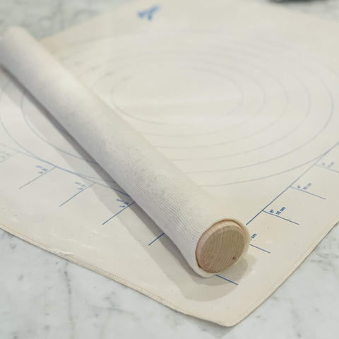 Ateco silk-screened circles guide dough sizing precisely.