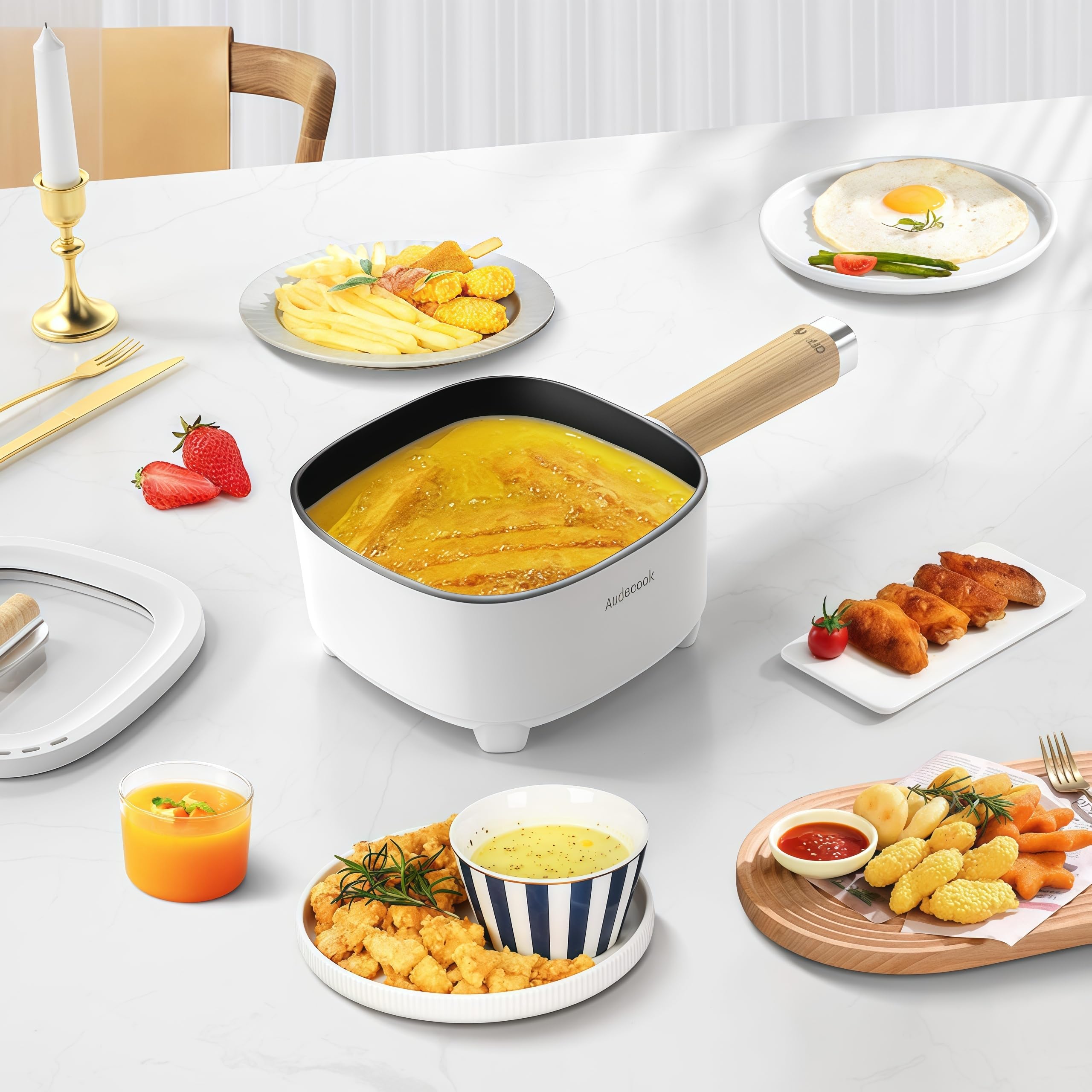 Audecook non-slip legs keep the pan stable on uneven surfaces.