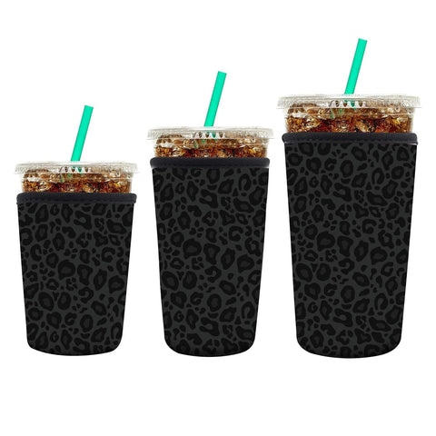 AUEKLLW leopard coffee sleeve Front view showing snug fit and condensation protection.