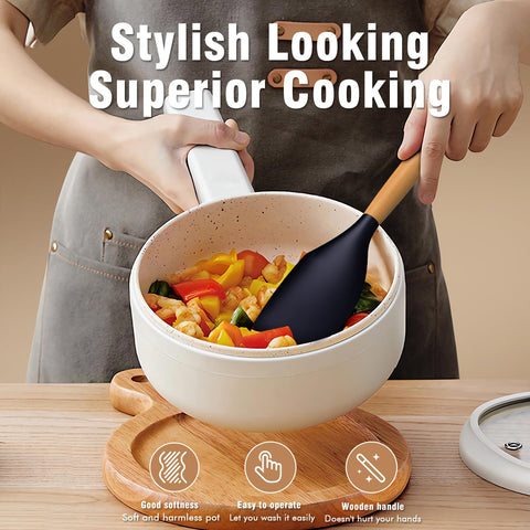 AVGPD navy blue pasta server with wooden handle lifting pasta smoothly.