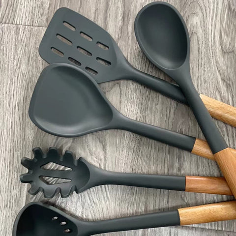 AVGPD silicone slotted spoon with wooden handle, gentle on coated cookware.