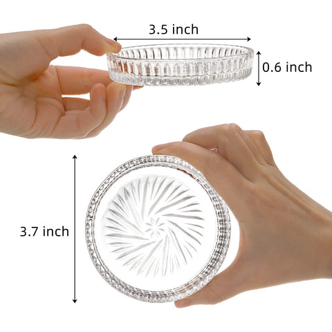 AVLA clear round coaster with raised edge protecting against condensation marks.