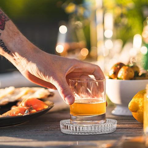 AVLA coaster 3.7 inch diameter fits most cups and wine glasses.
