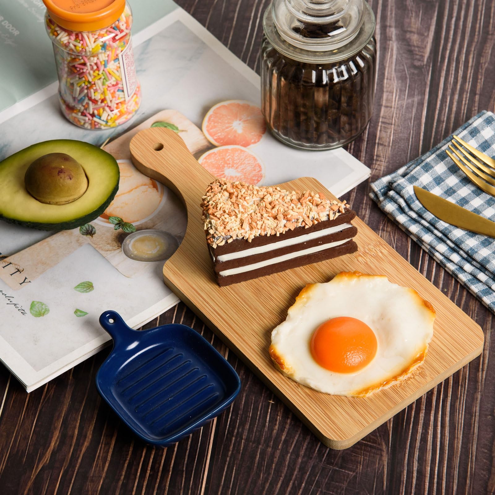 AWIZOM bamboo board used as a stylish charcuterie platter for cheeses and fruits.