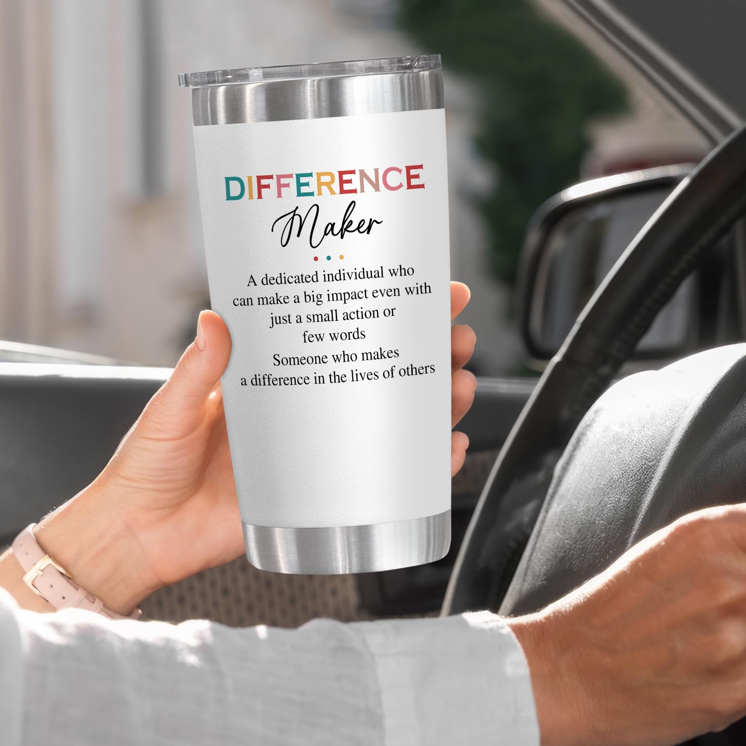 AXIARA tumbler on a desk highlights office-friendly hydration companion.