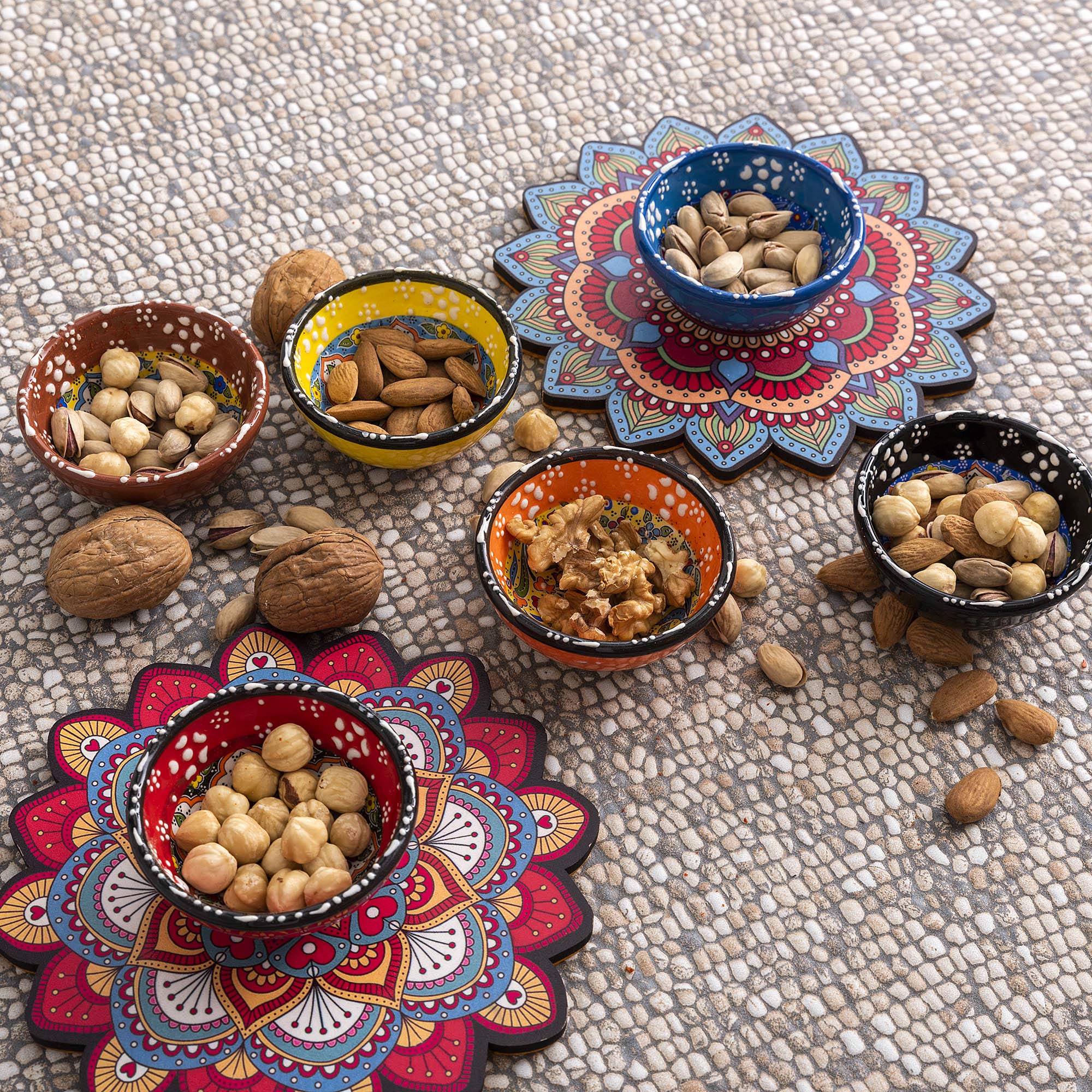 Ayennur pinch bowls arranged on a charcuterie board for dipping and nuts.
