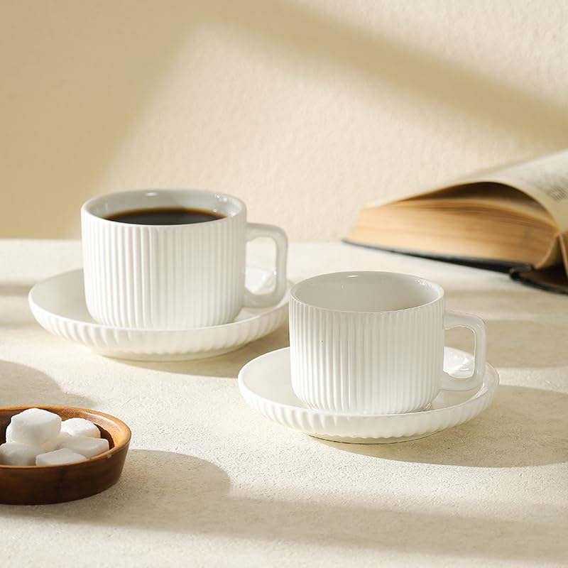 AYUCIA four-piece cup and saucer set creates a polished table presentation