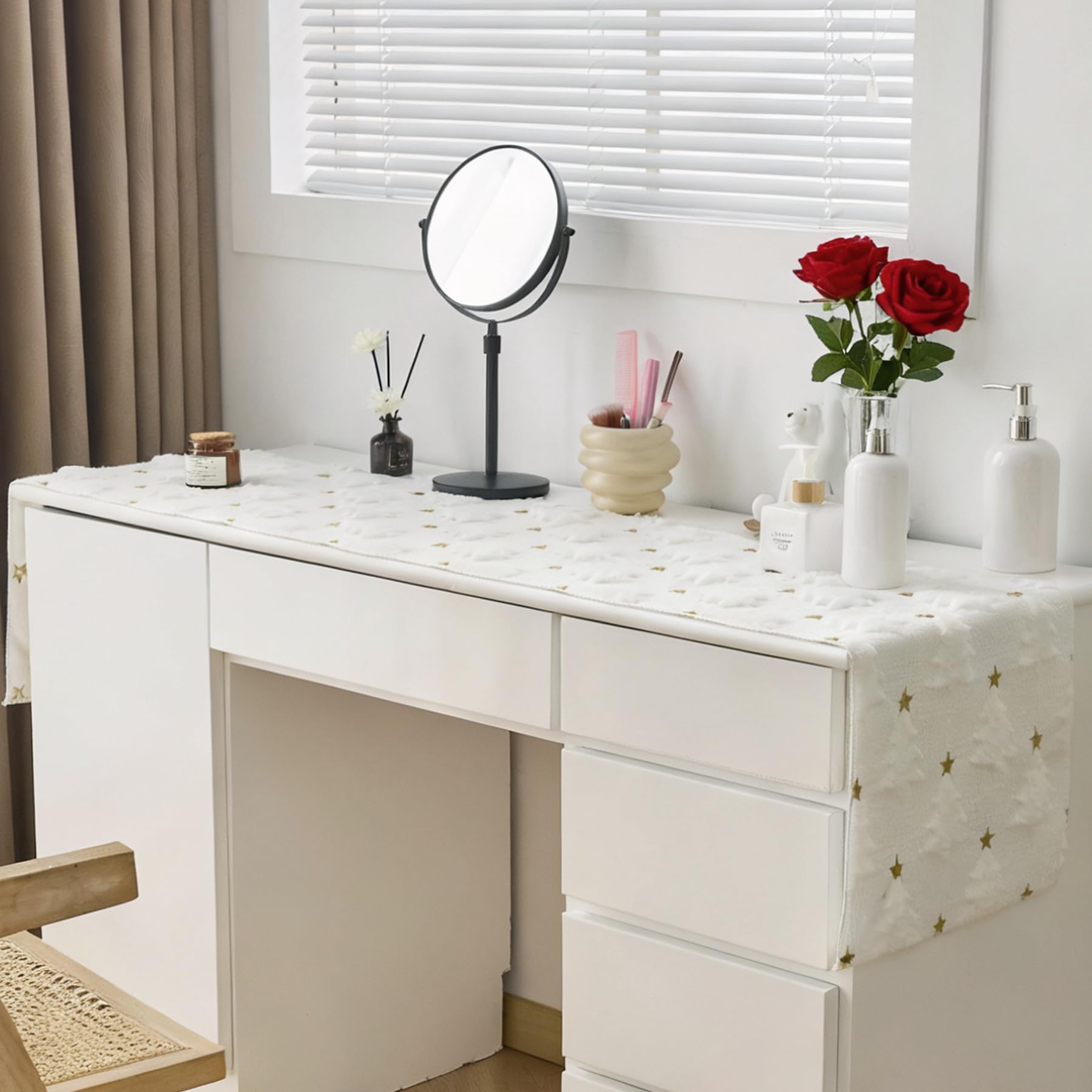 Baccessor dresser table decor with winter-themed runner.