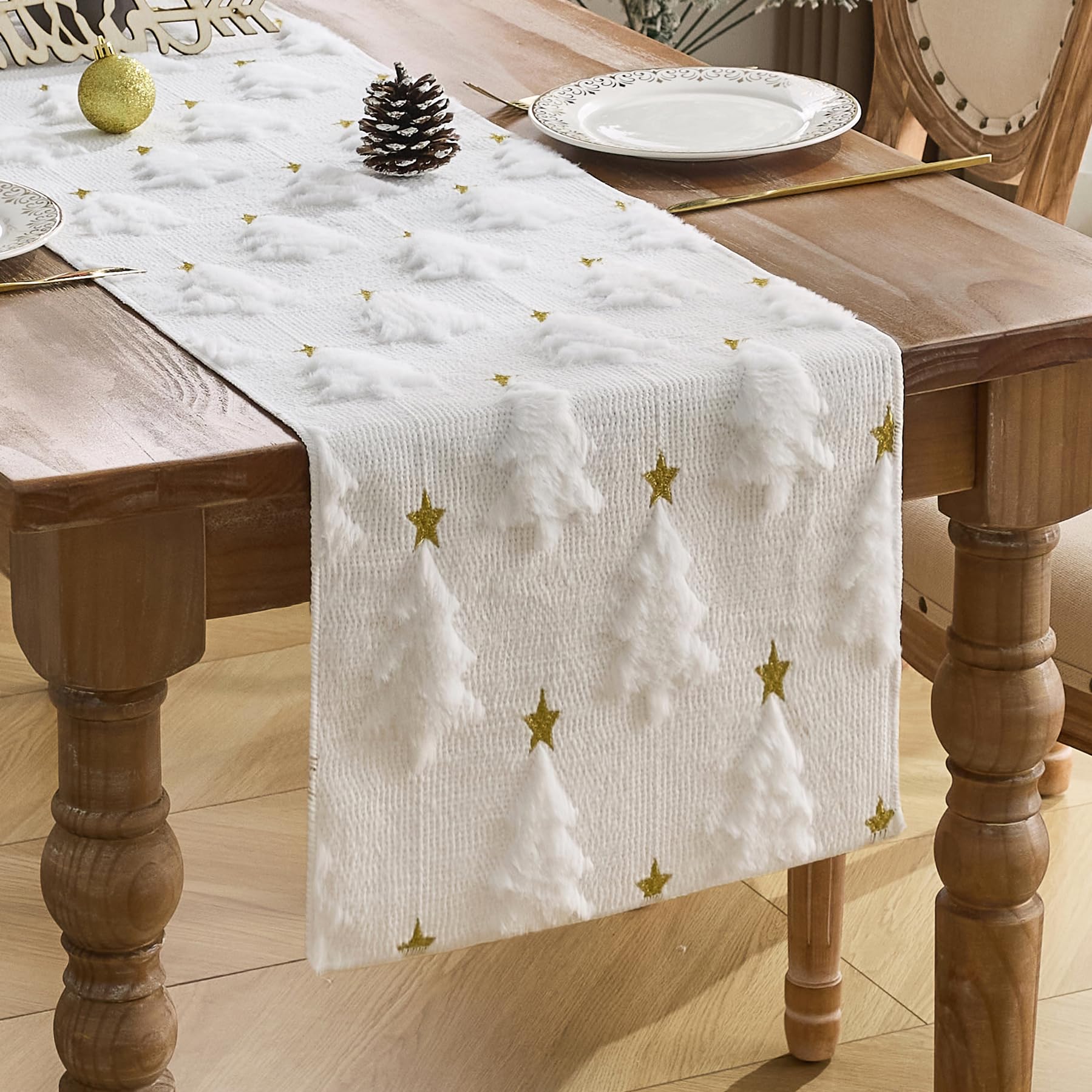 Baccessor winter white table runner with 3D tufting adds textured festive flair.