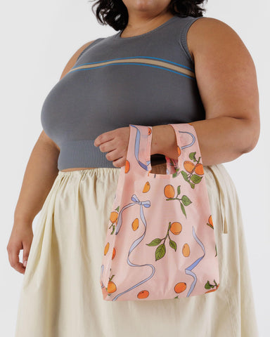 Baggu Amazon Baby Set of 3 in-use demonstrates quick morning routine on the go.