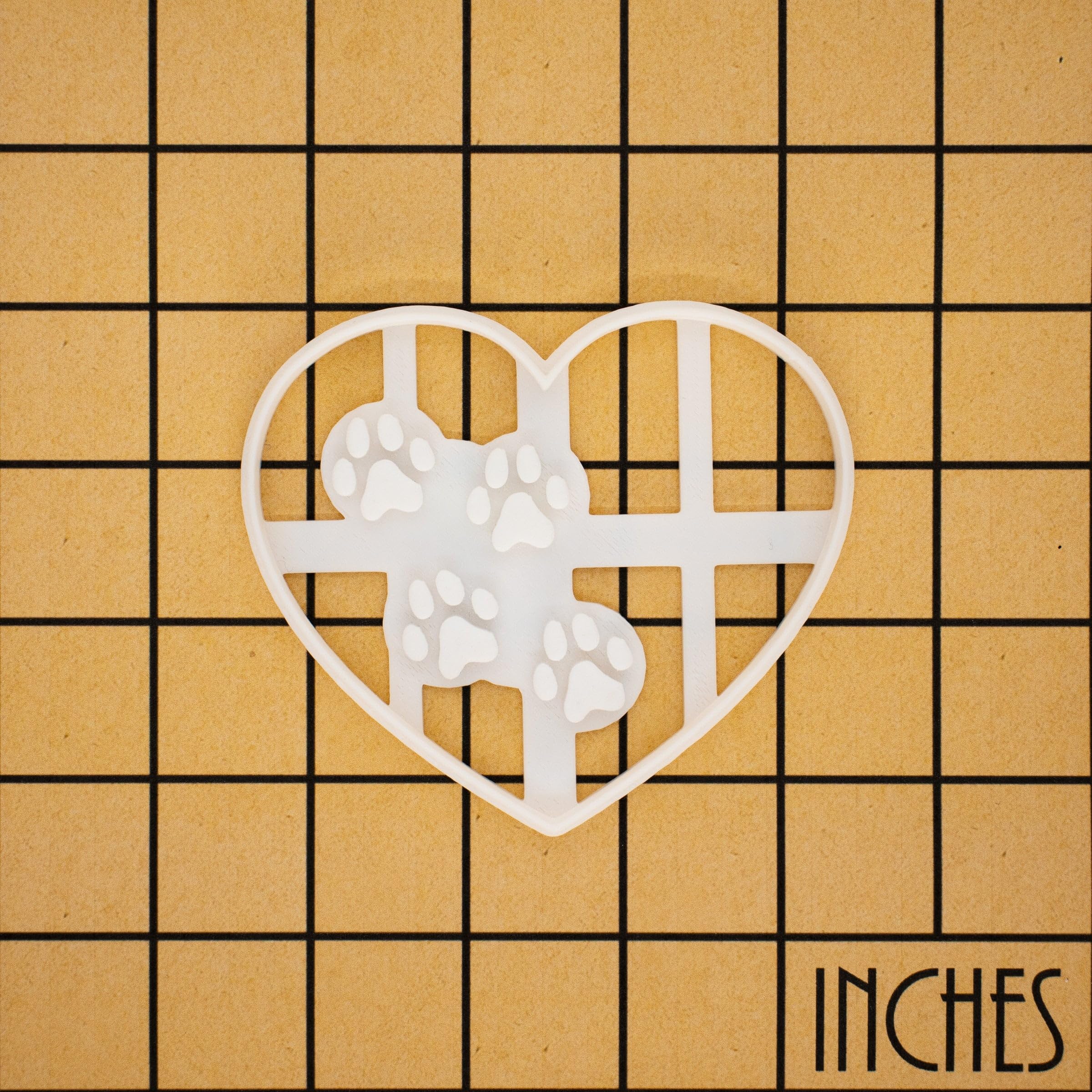 Bakerlogy Heart Paw Prints dust with flour for easy release.
