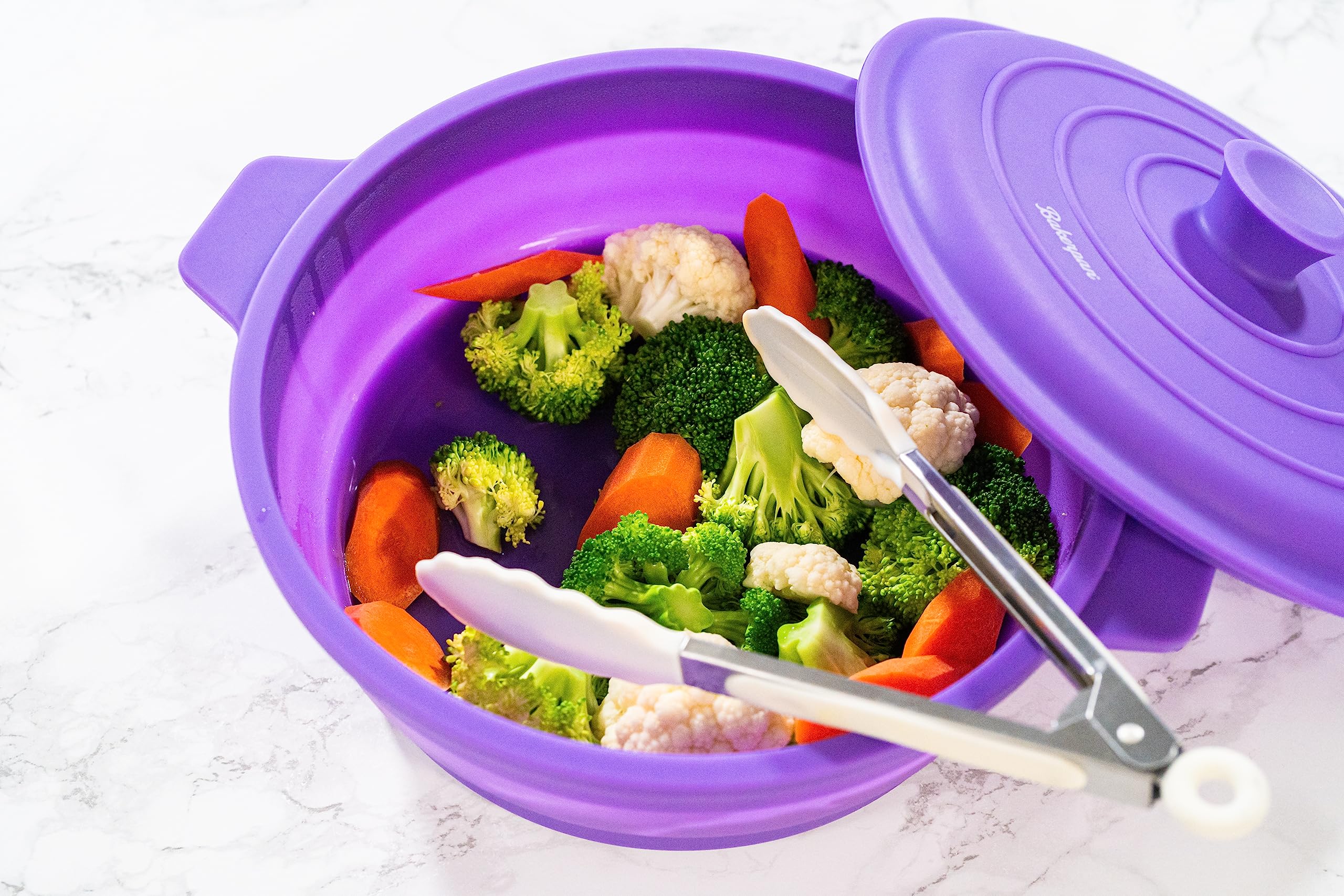 Bakerpan steamer compatible with microwave and air fryer for versatile cooking.