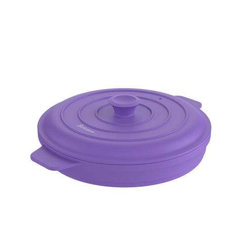 Bakerpan silicone steamer lid keeps steam contained for efficient cooking.