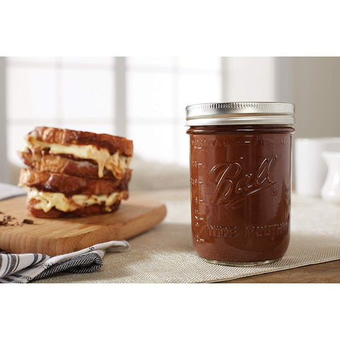Ball jar dessert layering idea demonstrates visual appeal and easy sharing.