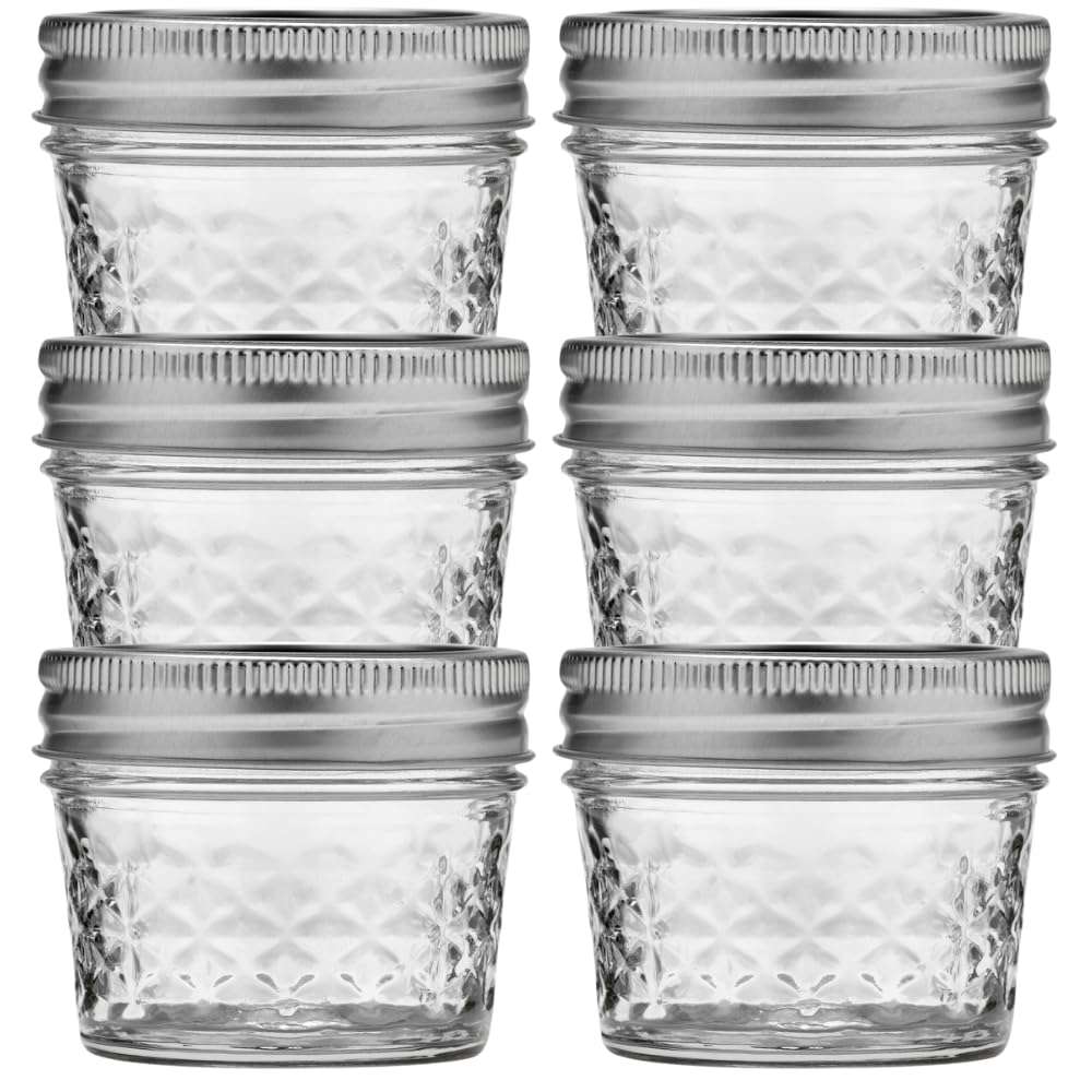 Ball wide-mouth quilted crystal jar with lid and band for canning and storage.