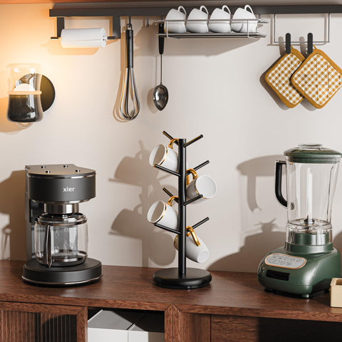 BAMBANG mug tree on a counter promotes quick mug reach and display.