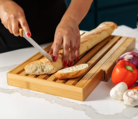 BAMBOO LAND bread slicer on a bamboo board for artisan loaves.